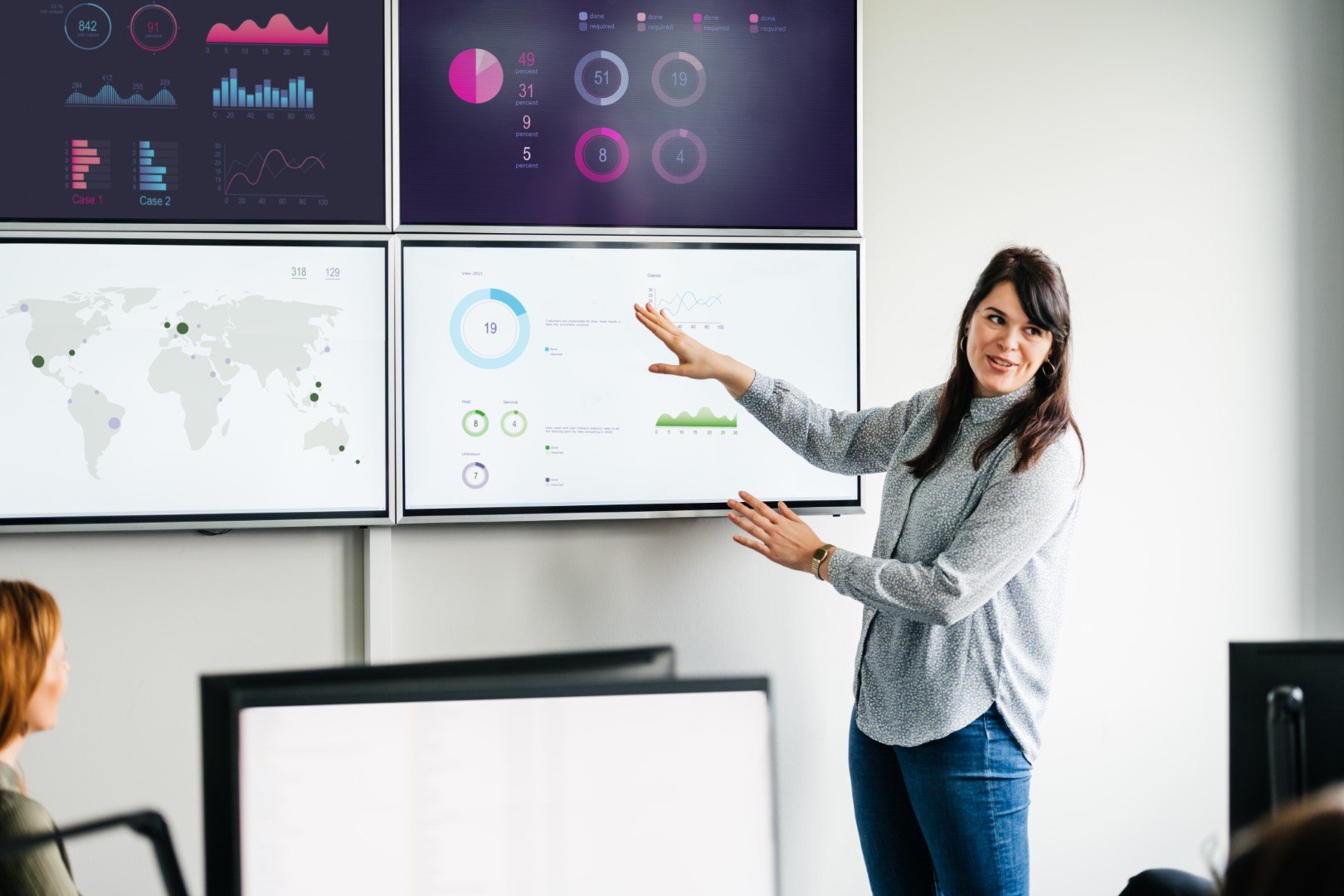 woman presenting business data reporting.jpg