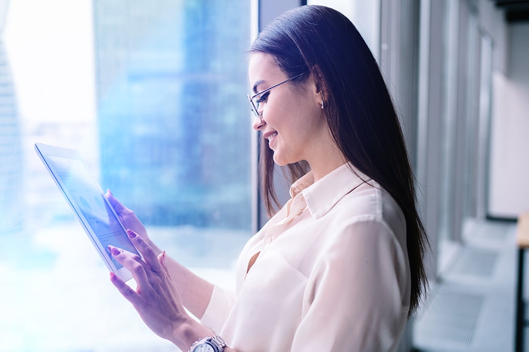 Woman checking tablet
